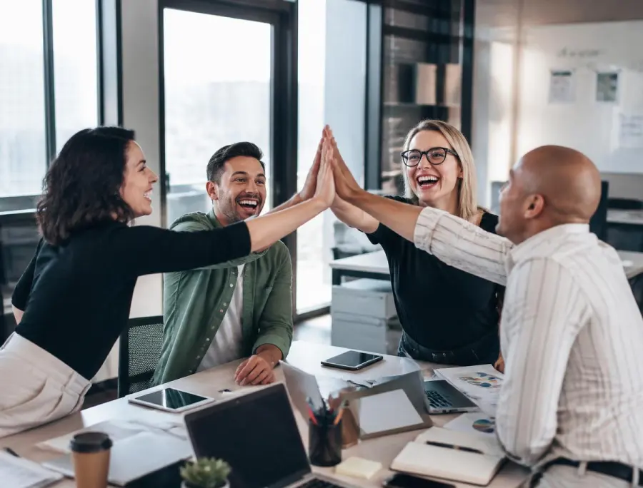 Team celebrating a client win